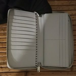 W57TH Zip around continental Pocket